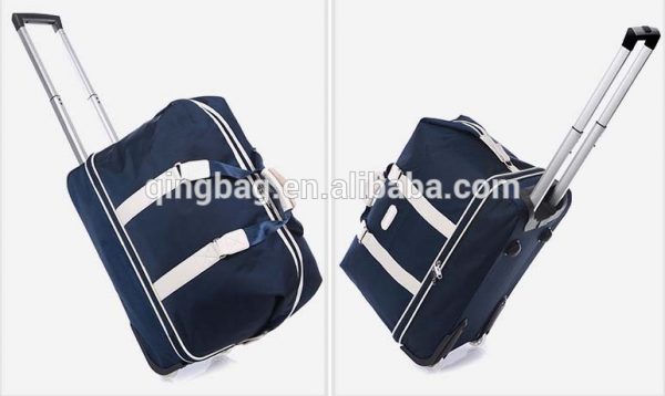 Large wheeled trolley duffel bag outdoor traveling strong blue heavy duty