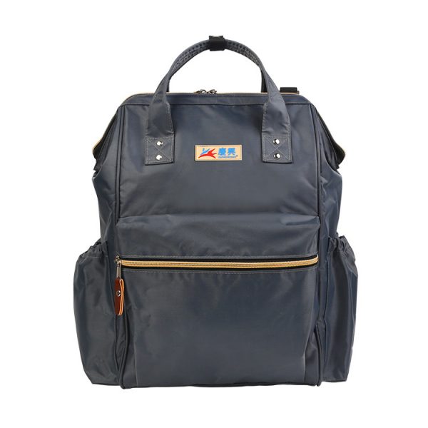 Hot selling in Amazon 900D waterproof polyester top quality diaper bag with changing pad
